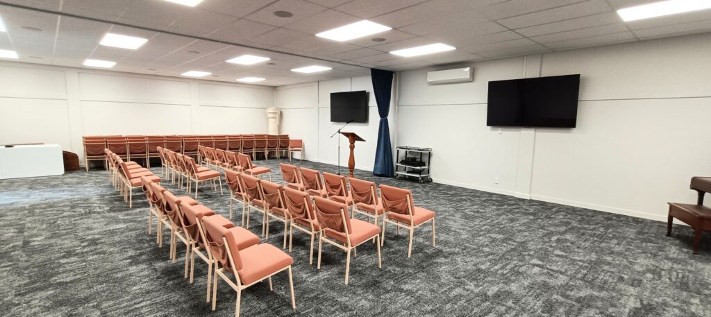 Conference room hire Hamilton East — Lodge Waikato meeting room with dual screens